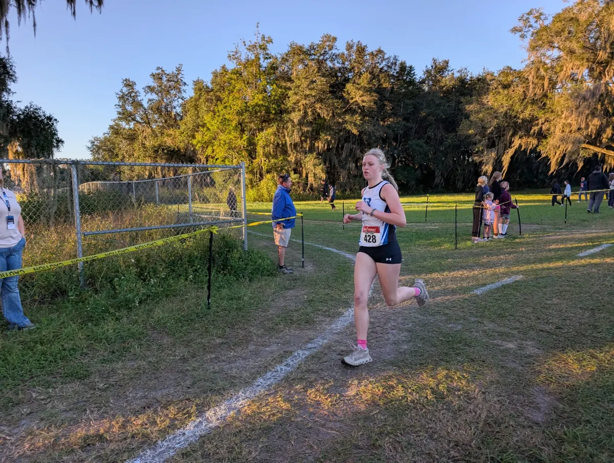 A Belleview High School girls runner on the cross country course at the 2026 Marion Athletic Conference championships