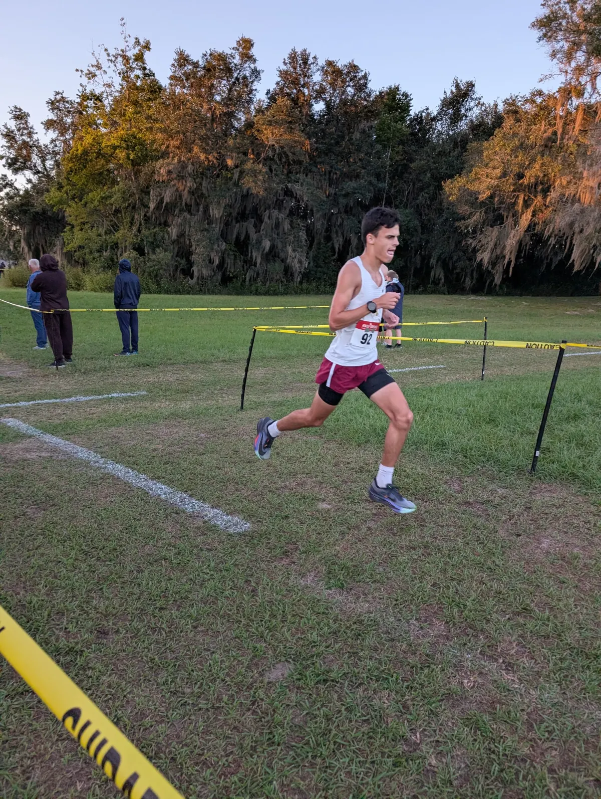 A North Marion High School runner nearing the finish of the boys' 5K at the 2026 Marion Athletic Conference cross country championships at Belleview High School