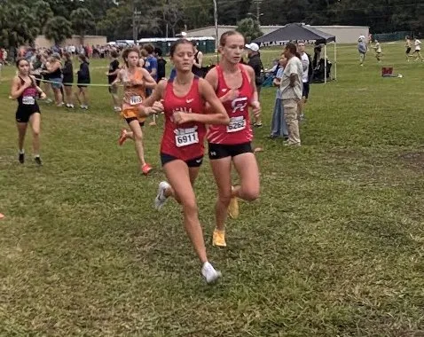 Vanguard High School sophomore Lyla Hallick running in the girls' elite 5K at the 2026 New World Fall Spectacular